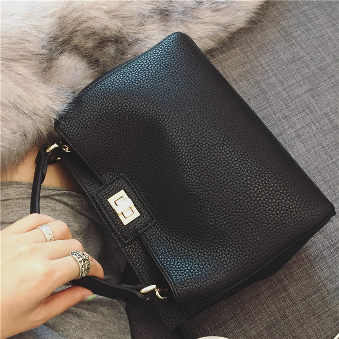Stylish Women's Cat Bag with Gold Lock Closure