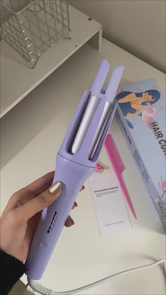R-C Automatic Rotating Negative Ion Hair Curler.
